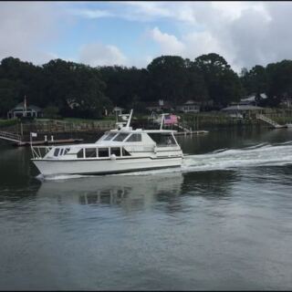 This South Carolina Ferry Trades the Airport for a 40-Minute Dolphin-Escorted Ride to a Car-Free Island