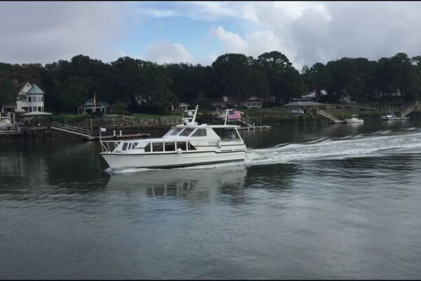 This South Carolina Ferry Trades the Airport for a 40-Minute Dolphin-Escorted Ride to a Car-Free Island