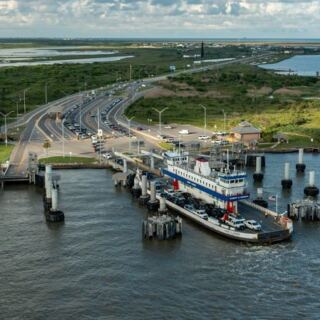 This Free Galveston, Texas Ferry Runs 24/7 to Bolivar Peninsula, and Dolphins Often Show Up on the Ride