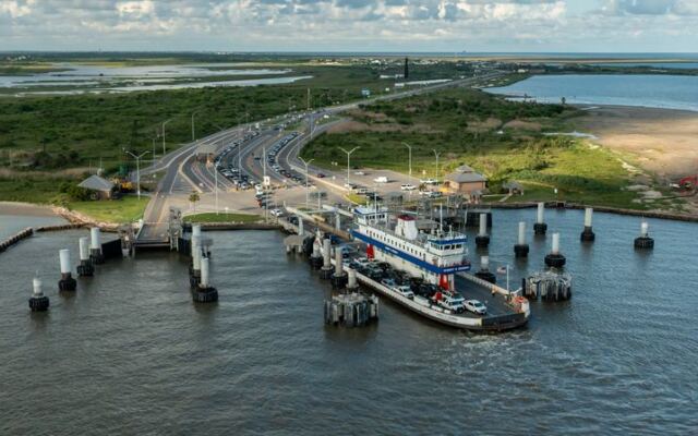 This Free Galveston, Texas Ferry Runs 24/7 to Bolivar Peninsula, and Dolphins Often Show Up on the Ride