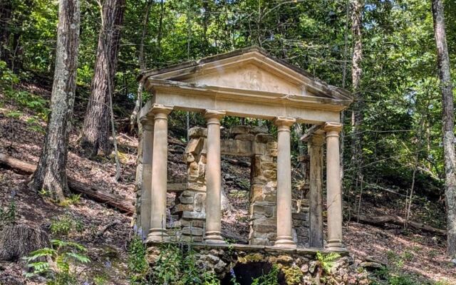 A Short Walk Through the Massachusetts Woods Leads to a Hidden Japanese Garden With Koi Ponds and Stone Lanterns