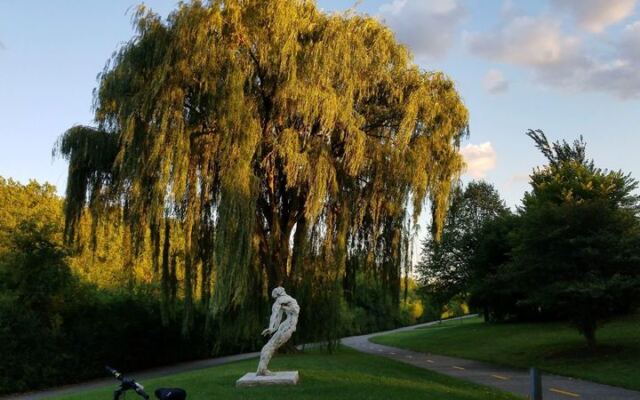 This Free Illinois Sculpture Trail Lets You Track Down 60 Artworks Along A Two-Mile Wooded Path