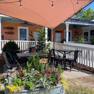 Brick-Oven Pizza Comes Out Right Beneath the Southport Water Tower at This Coastal Spot