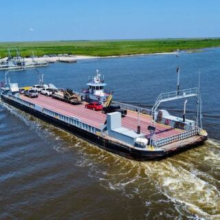 This Free Louisiana Ferry Glides You Past Dolphins Instead of the Long Drive Around Lake Charles