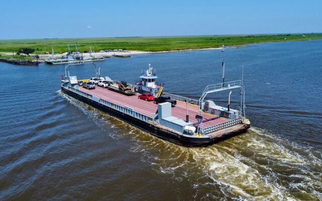 This Free Louisiana Ferry Glides You Past Dolphins Instead of the Long Drive Around Lake Charles