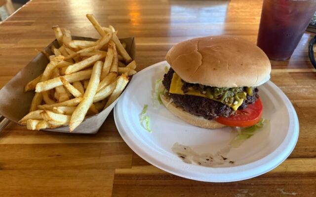 This Rustic Roadhouse Just Off The New Mexico Highway Grills One Of The State’s Most Famous Green Chile Cheeseburgers