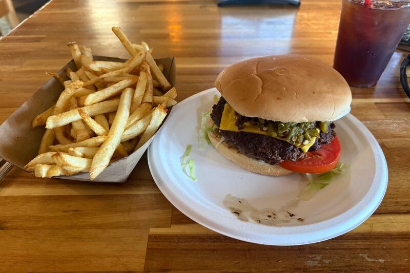 This Rustic Roadhouse Just Off The New Mexico Highway Grills One Of The State’s Most Famous Green Chile Cheeseburgers