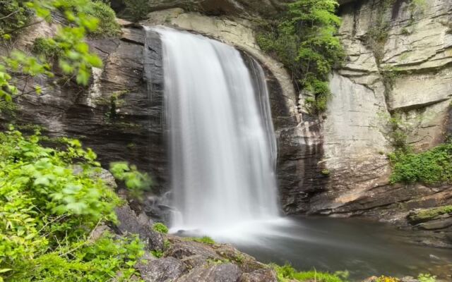 This Roadside North Carolina Waterfall Hides a Plunge Pool You Can Actually Swim Beneath