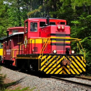 Just Outside Raleigh, This Volunteer-Run Vintage Railroad Carries You Through the Woods in Restored Antique Train Cars