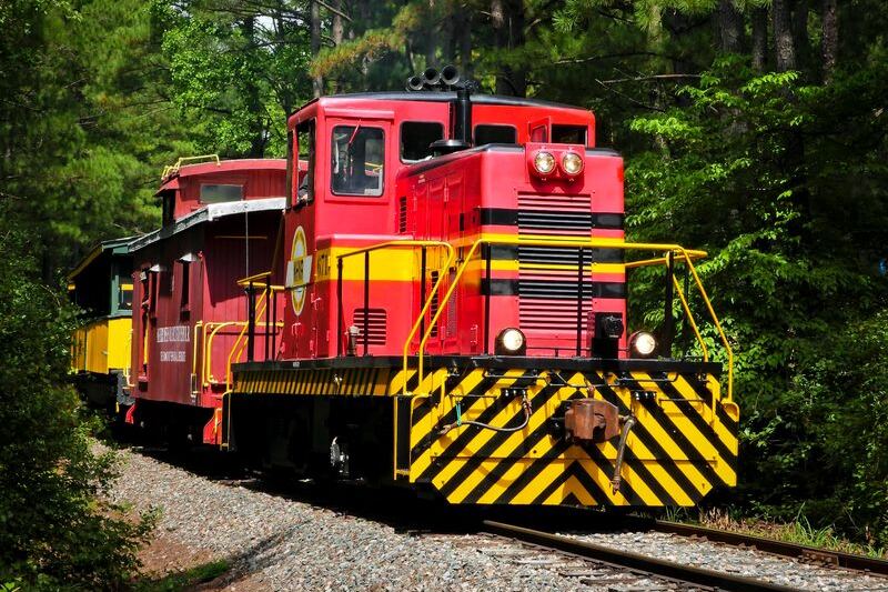 Just Outside Raleigh, This Volunteer-Run Vintage Railroad Carries You Through the Woods in Restored Antique Train Cars