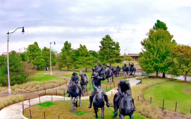 This Free Oklahoma City Sculpture Walk Lines A Canal Path With Larger-Than-Life Bronze Horses And Riders