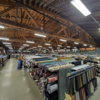 Quilters Cross State Lines To Dig Through This Chicago Warehouse Stacked With Thousands Of Fabric Bolts