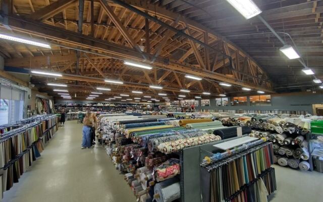 Quilters Cross State Lines To Dig Through This Chicago Warehouse Stacked With Thousands Of Fabric Bolts