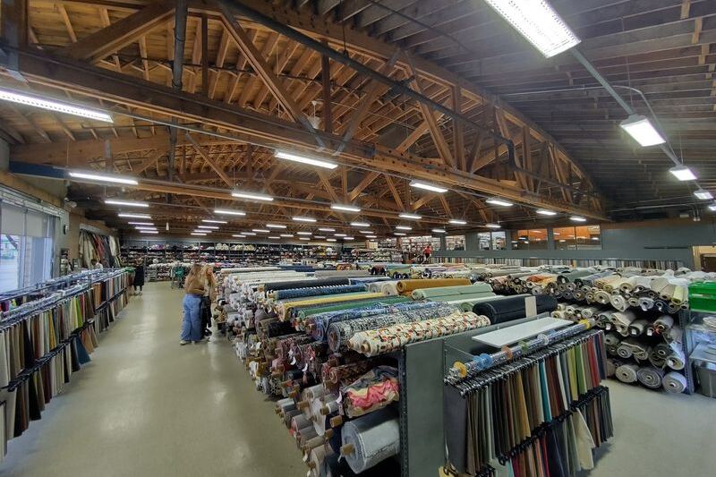 Quilters Cross State Lines To Dig Through This Chicago Warehouse Stacked With Thousands Of Fabric Bolts
