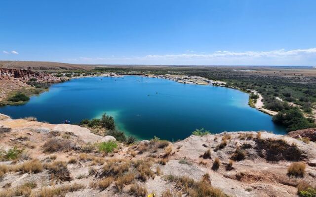 This New Mexico State Park Turns Desert Sinkholes Into Clear Blue Lakes You Can Actually Swim In