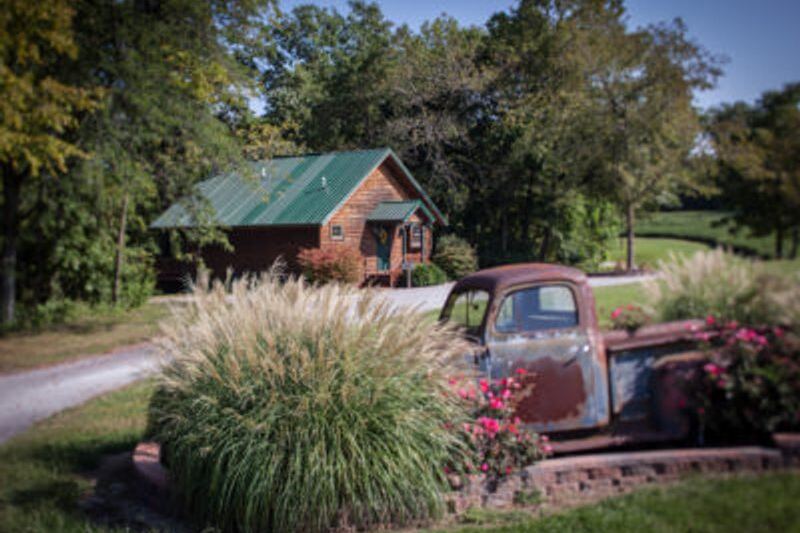 This Secluded Southern Illinois Cabin Has a Cozy Fireplace and a Pond View You Can Watch From Bed