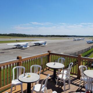 This Georgia Airport Restaurant Has A Covered Porch Where You Watch Small Planes Land Right Off The Runway