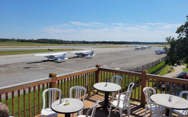 This Georgia Airport Restaurant Has A Covered Porch Where You Watch Small Planes Land Right Off The Runway