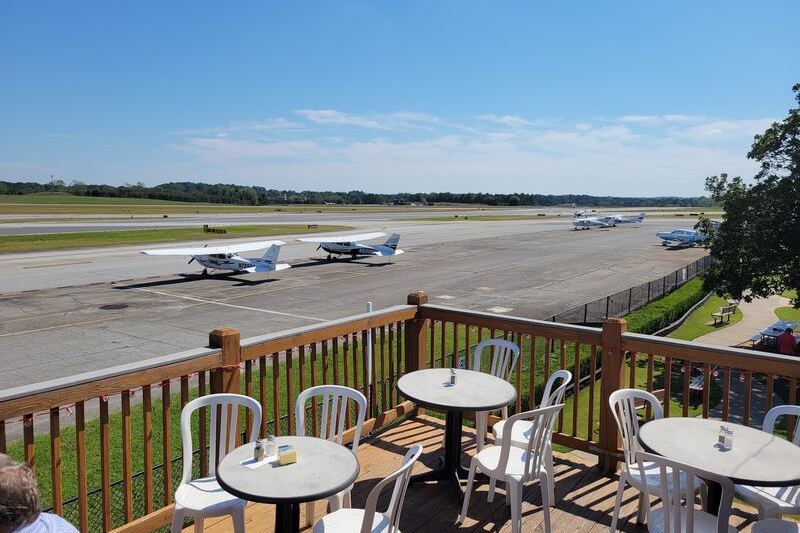 This Georgia Airport Restaurant Has A Covered Porch Where You Watch Small Planes Land Right Off The Runway