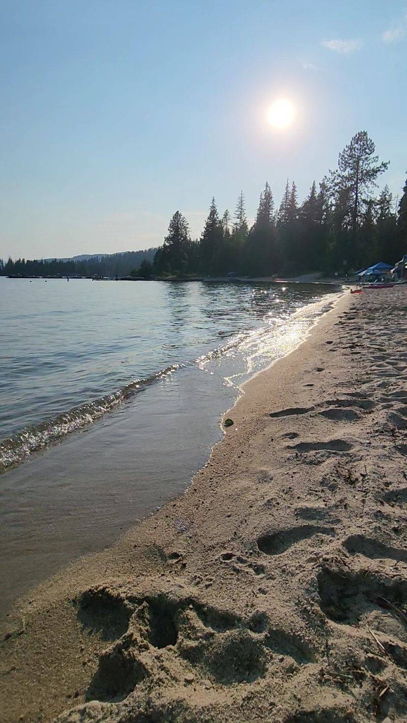 A Long Beach With Water You Can See Through A Long Beach With Water You Can See Through
