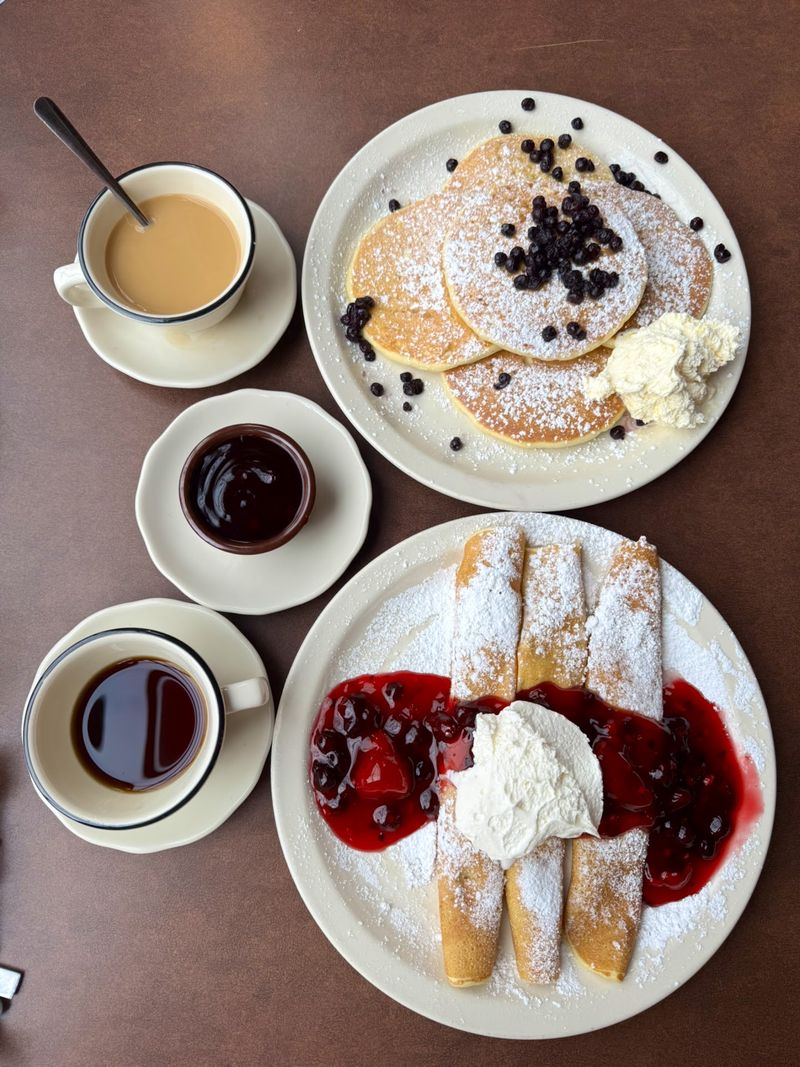 A Menu Stacked With Pancake Choices A Menu Stacked With Pancake Choices