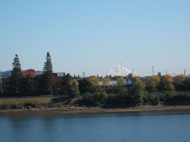 A River City Under a Snowy Peak