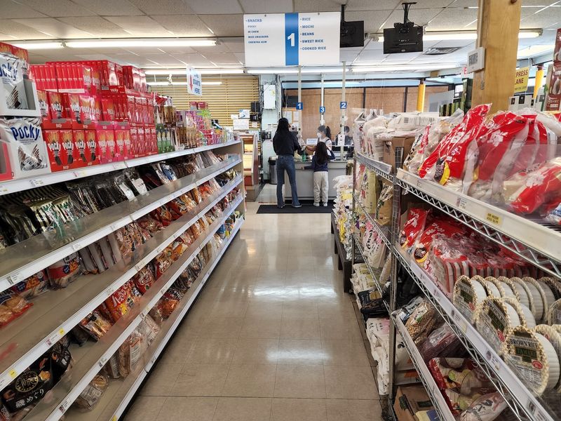 Aisles Packed With Pantry Staples And Sauces