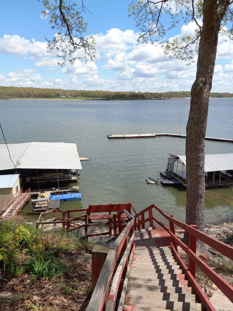 Boats, Jet Skis, and a Fishing Dock Boats, Jet Skis, and a Fishing Dock