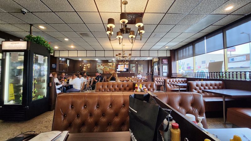Booths, Silverware Hum, and Decades of History Booths, Silverware Hum, and Decades of History