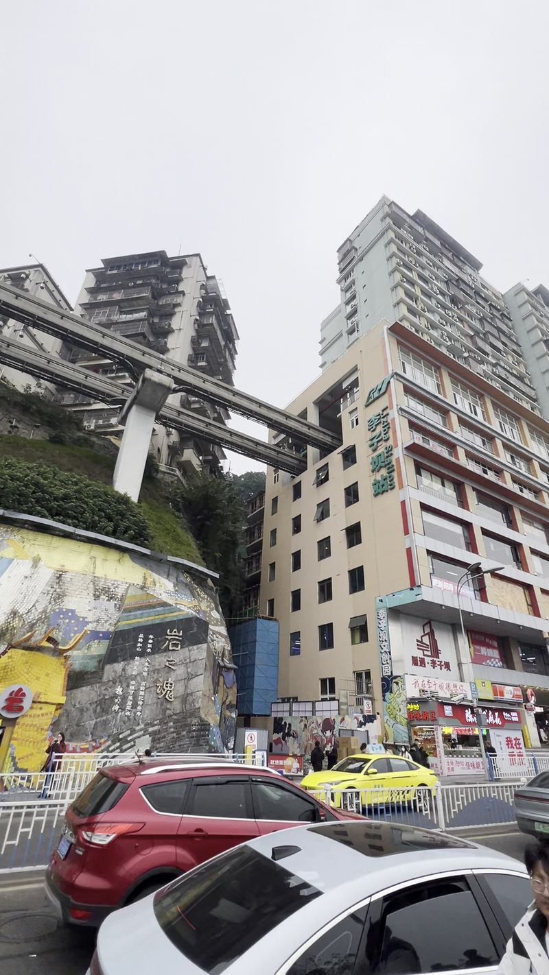Chongqing's Train Passing Through a Residential Building Chongqing's Train Passing Through a Residential Building
