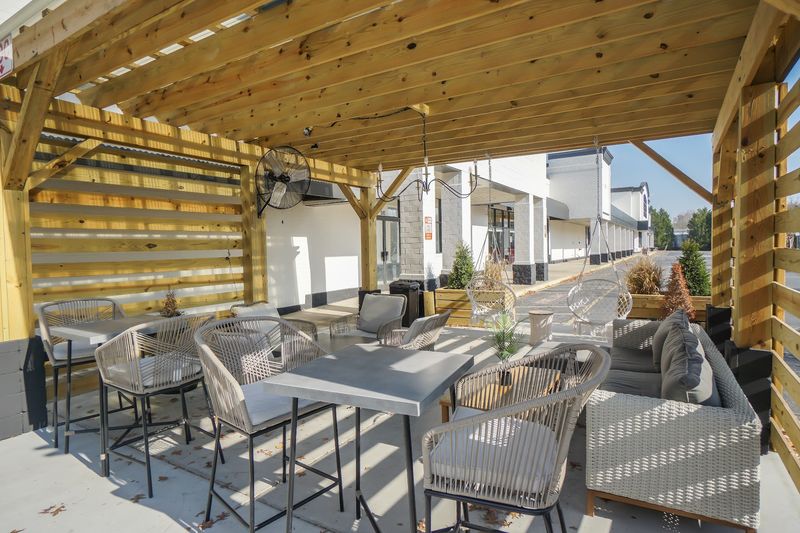 Couches, Bar Stools, and a Twinkling Patio Couches, Bar Stools, and a Twinkling Patio