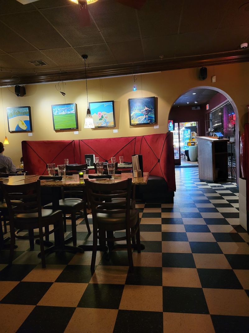 Cozy Booths, Bright Art, and a Hushed Dining Room Cozy Booths, Bright Art, and a Hushed Dining Room