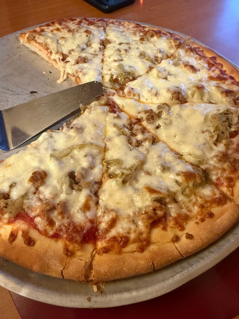Crumbled Sausage Makes the Pizza Different Crumbled Sausage Makes the Pizza Different