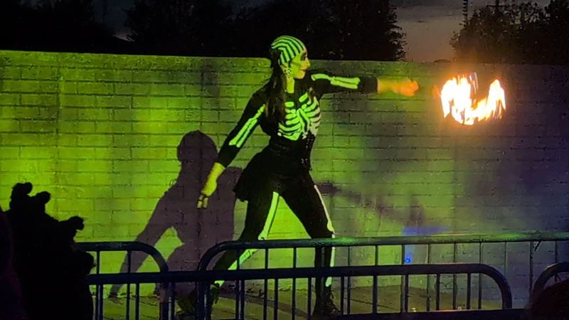 Fire Dancers Turn the Line Into a Show