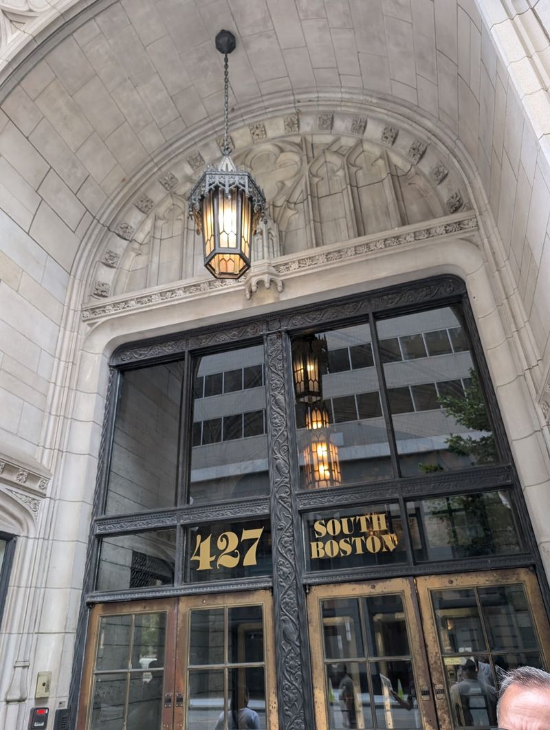Heavy Brass Doors and a First Impression