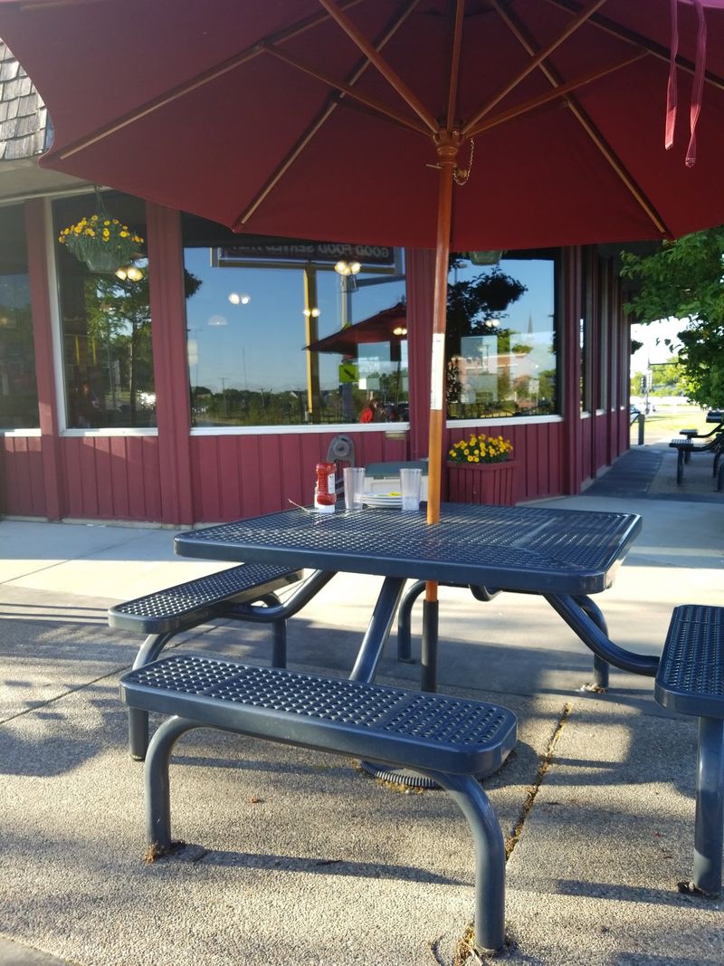 Mom-And-Pop Coziness With Seats Inside And Out