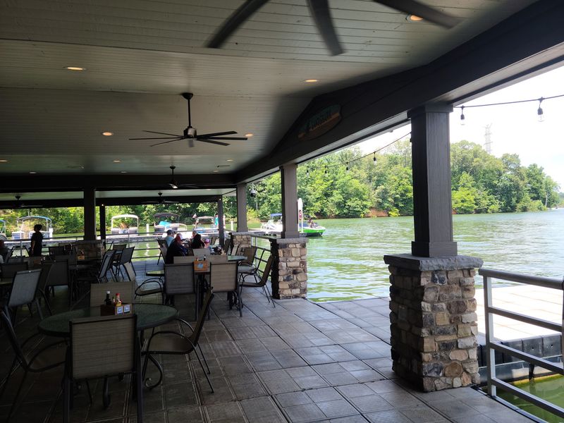 Open-Air Tables Over Clear Water