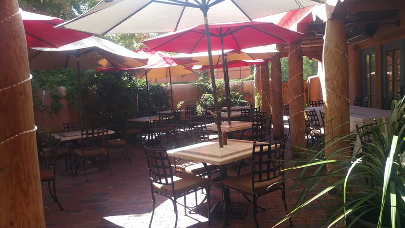 Patio Seating and a Lively Bar Patio Seating and a Lively Bar