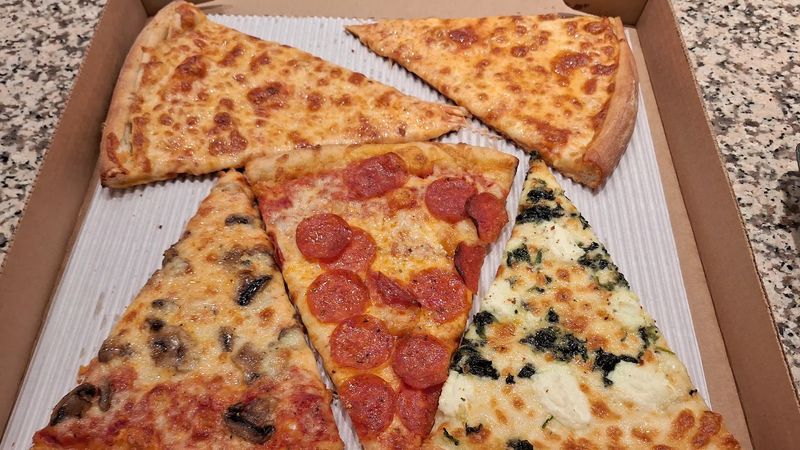 Pizza by the Slice in the Back