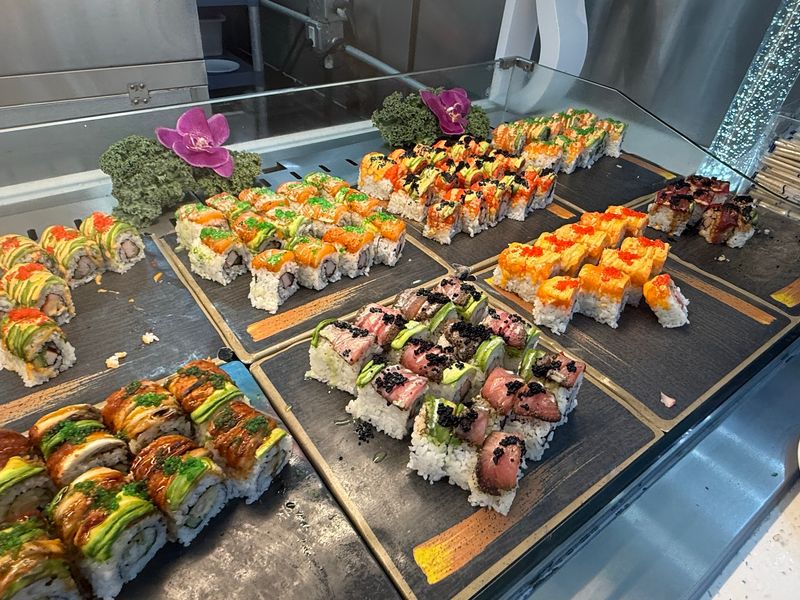 Rolls, Sashimi, and a Sushi Lover's Lap Rolls, Sashimi, and a Sushi Lover's Lap