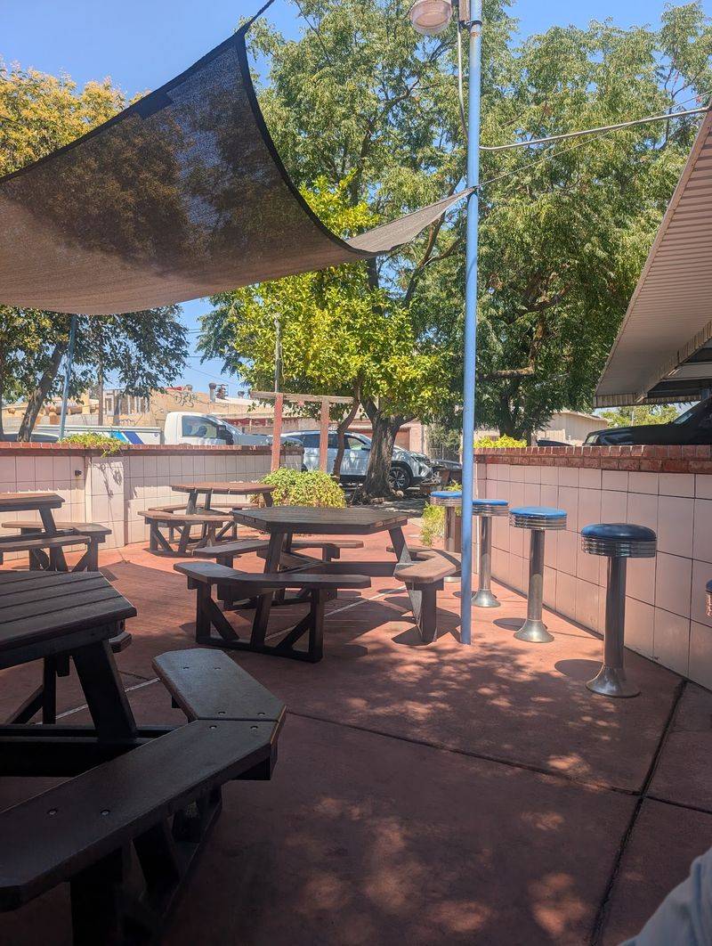 Shaded Patios, Oldies Vibes, and Smiling Servers Shaded Patios, Oldies Vibes, and Smiling Servers