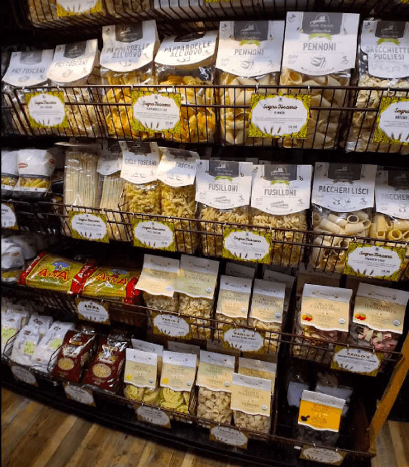 Shelves Stocked with Homemade Pasta and Sauces