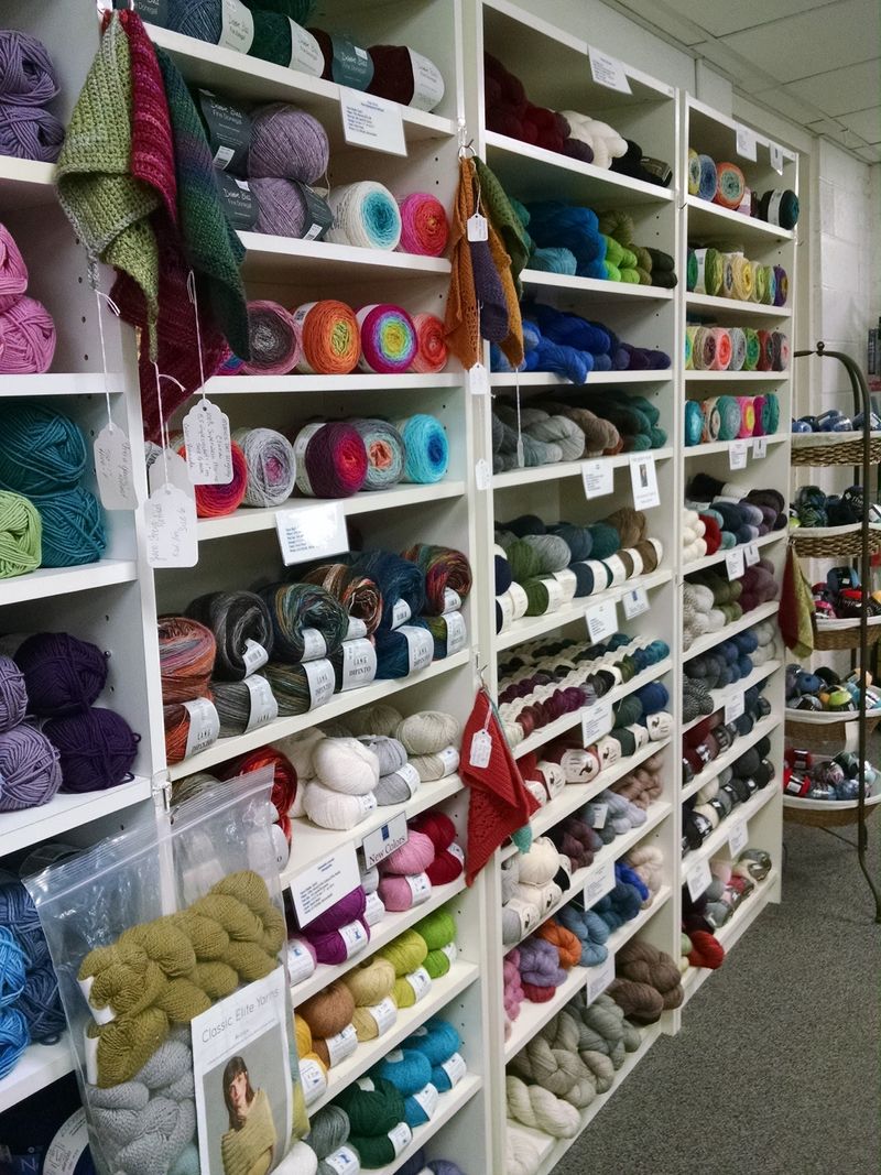 Shelves of Brands, Samples, and House Yarns