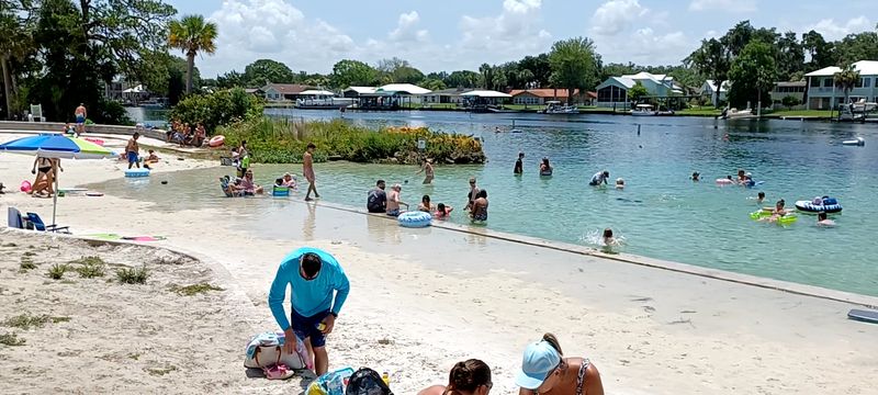 Soft White Sand and a Roped-Off Wading Zone for Little Swimmers Soft White Sand and a Roped-Off Wading Zone for Little Swimmers