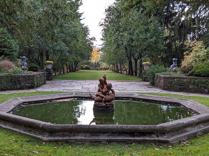 Statuary and a Koi Pond Statuary and a Koi Pond
