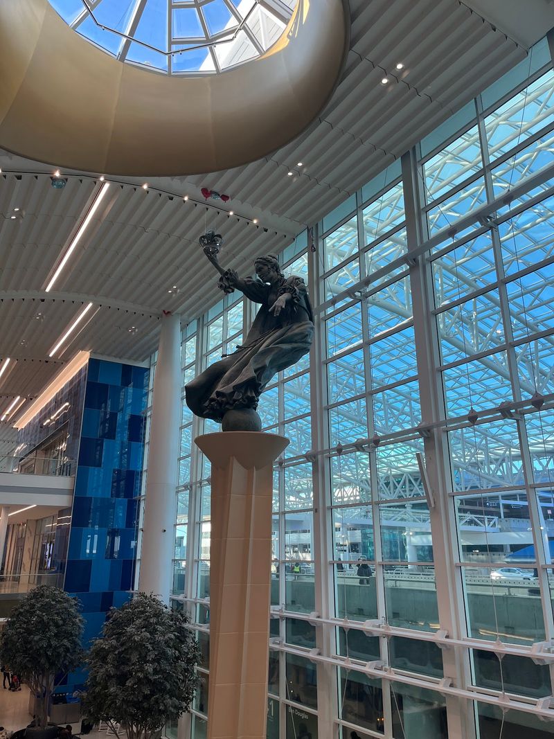 Sunlit Atrium, Art, and a 60-Foot Sculpture Sunlit Atrium, Art, and a 60-Foot Sculpture