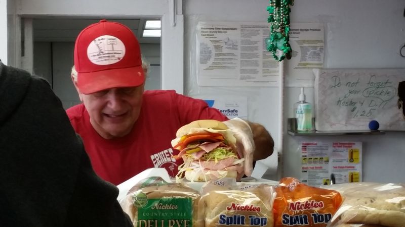 The Owner in the Red Ball Cap