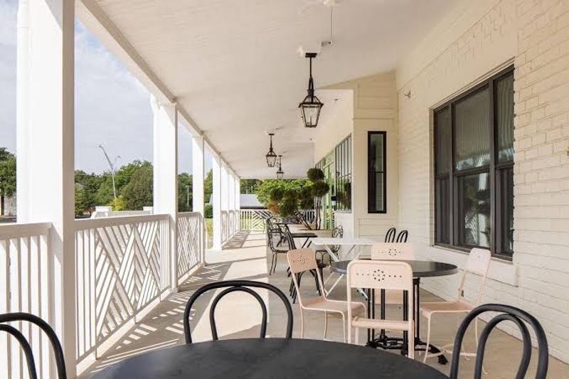 Wraparound Porch and Garden Courtyard Wraparound Porch and Garden Courtyard