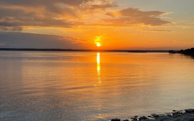 Anglers Chase Catfish, Bass, and Stripers on This Texas Reservoir, Where Lakeside Campsites Catch Both Sunrise and Sunset