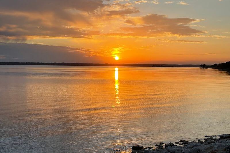 Anglers Chase Catfish, Bass, and Stripers on This Texas Reservoir, Where Lakeside Campsites Catch Both Sunrise and Sunset